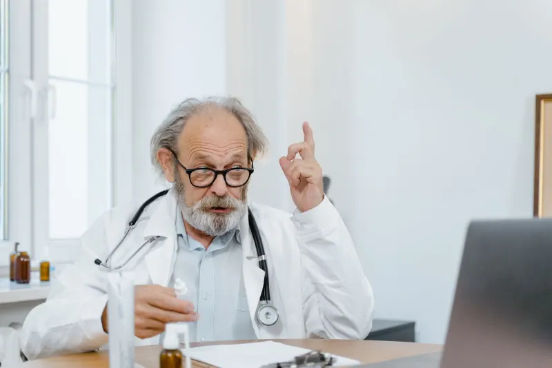 Senior doctor having an online consultation