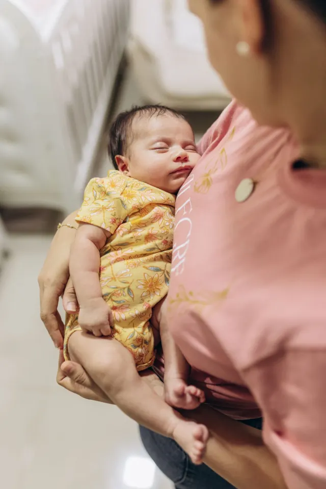 Mother holding a newborn baby